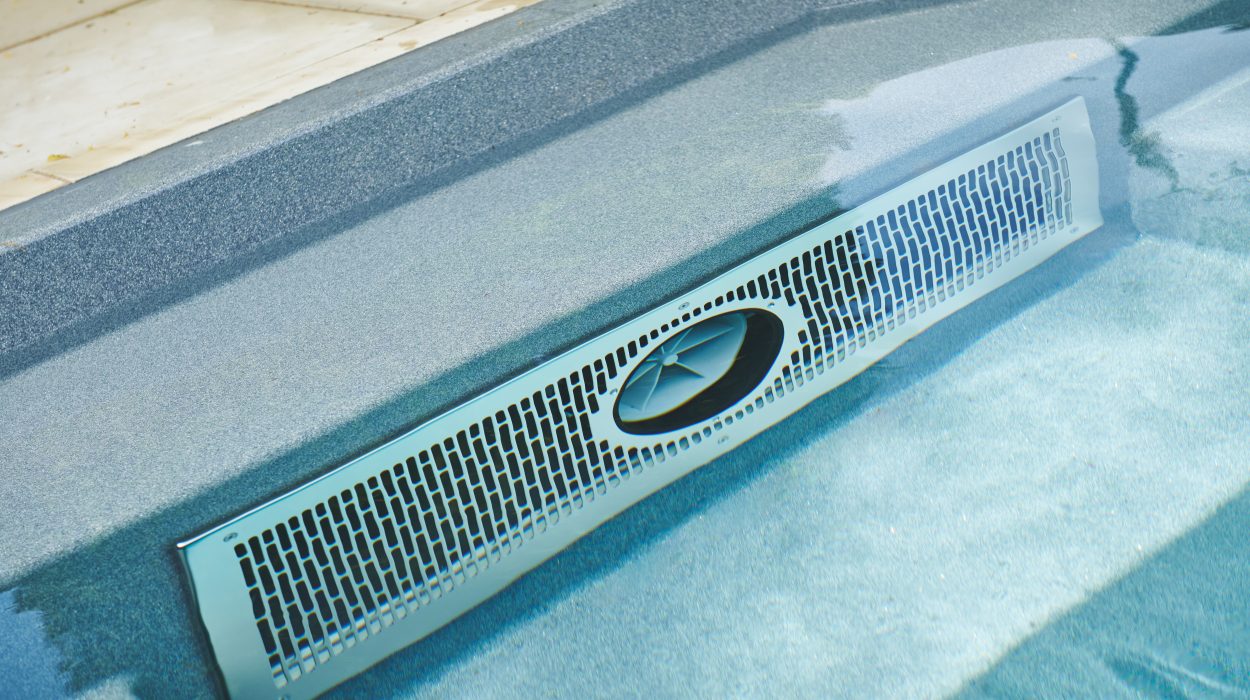 Close-up of a swim spa jet and filtration system underwater.