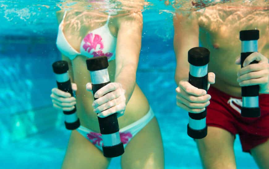 People doing underwater fitness excercises