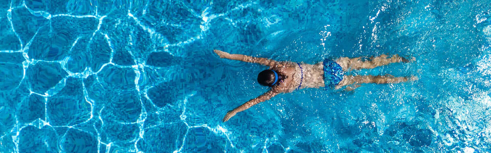 Woman Swimming Birdseye