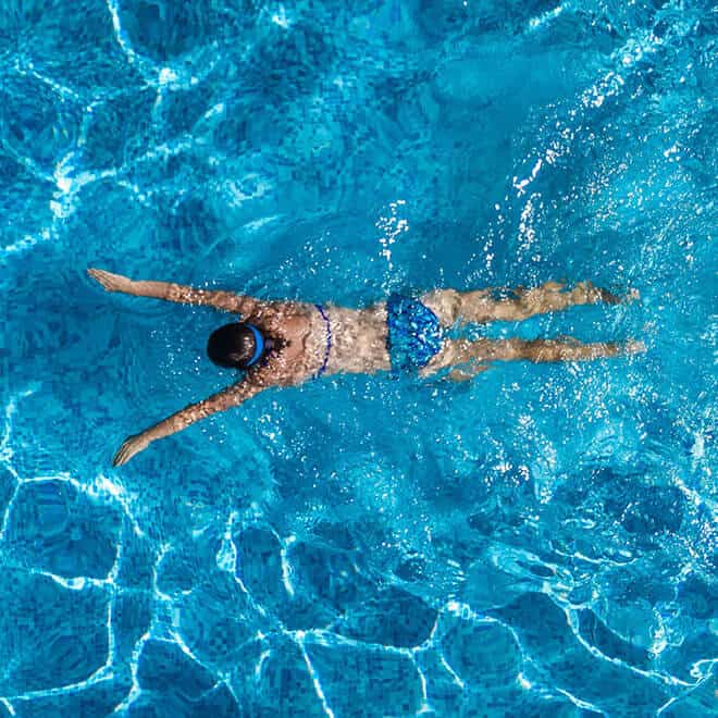 Compass Pools Man in pool